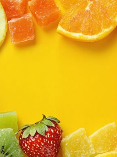 An engaging visual of freeze-dried candy mixed with fresh fruits, highlighting healthy snacking options for children.